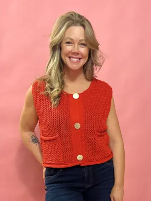 Cozy Charm: Red Sweater Vest with Oversized Buttons