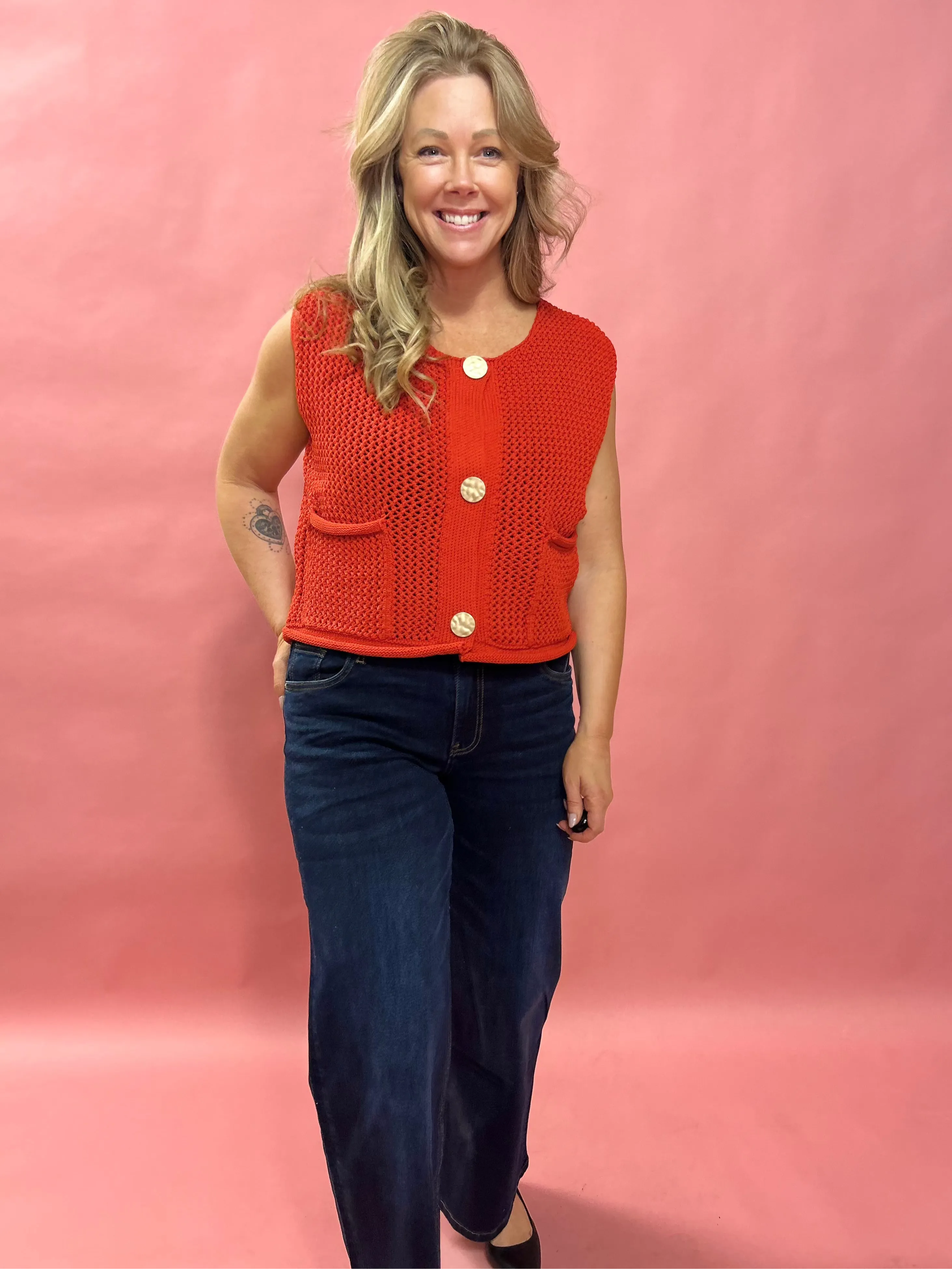 Cozy Charm: Red Sweater Vest with Oversized Buttons